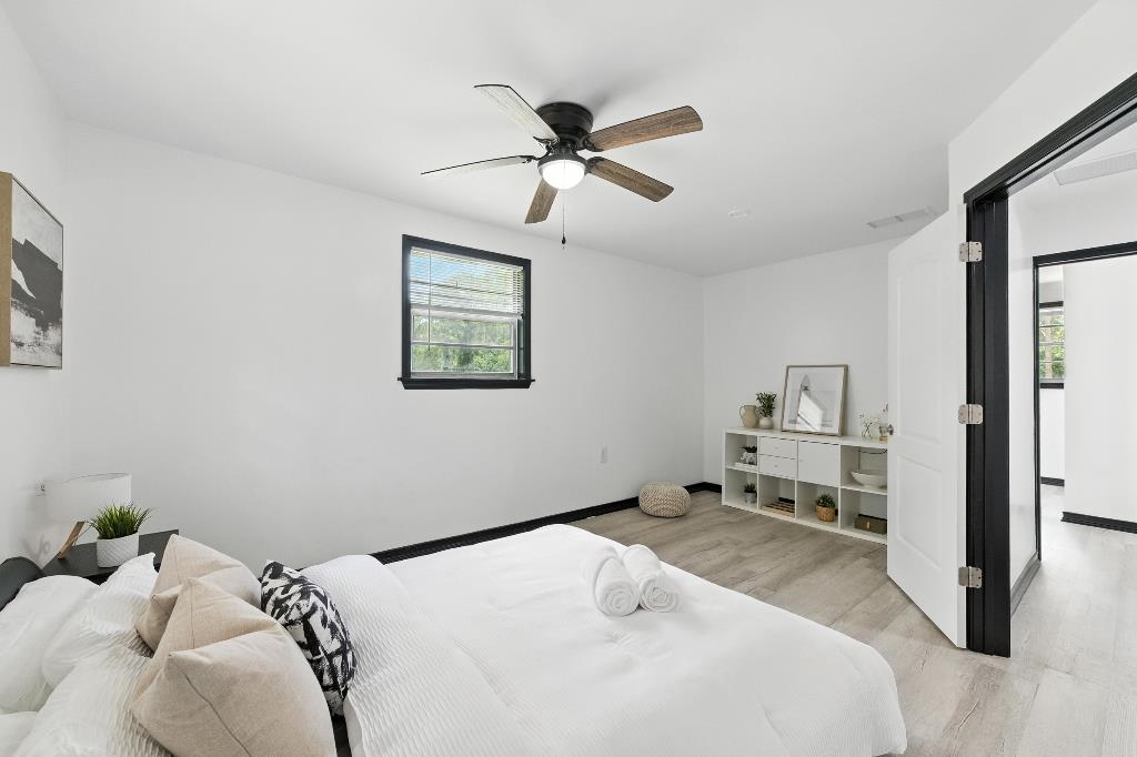 1637 Starratt Road Jacksonville, FL 32218 - Photo 3 of 44 a bedroom with a bed and a window