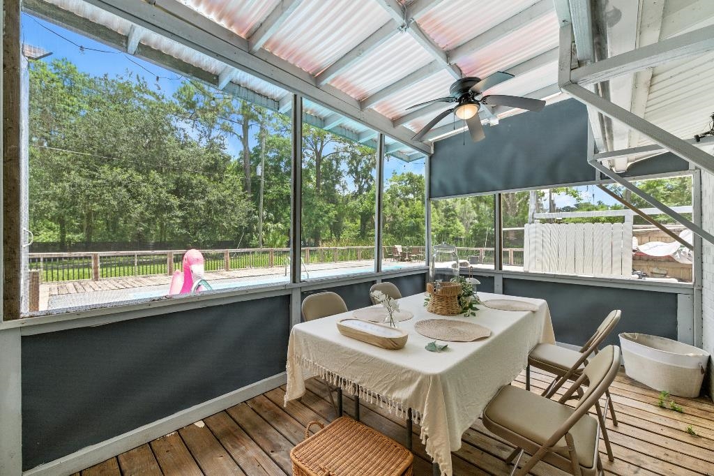 1637 Starratt Road Jacksonville, FL 32218 - Photo 32 of 44 a view of a patio with a table chairs and a table
