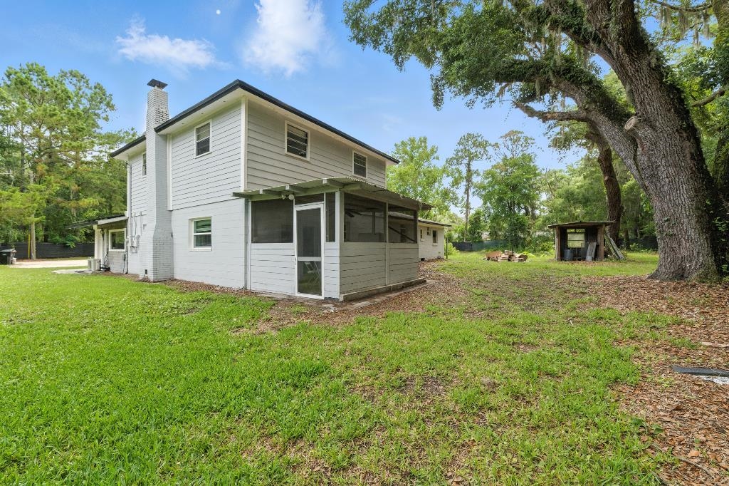 1637 Starratt Road Jacksonville, FL 32218 - Photo 34 of 44 a front view of a house with a garden