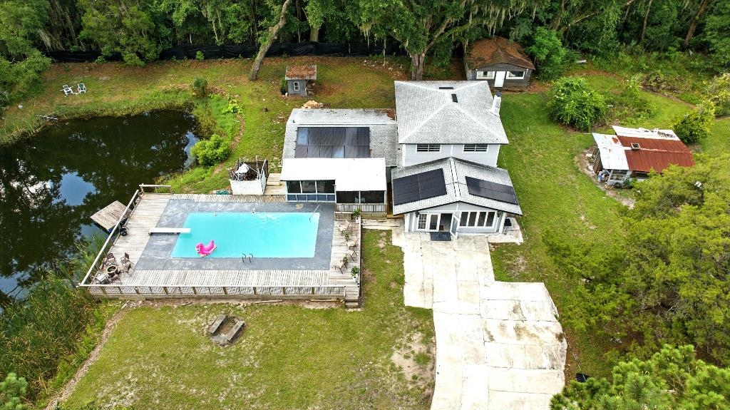 1637 Starratt Road Jacksonville, FL 32218 - Photo 36 of 44 an aerial view of a house with swimming pool and outdoor space