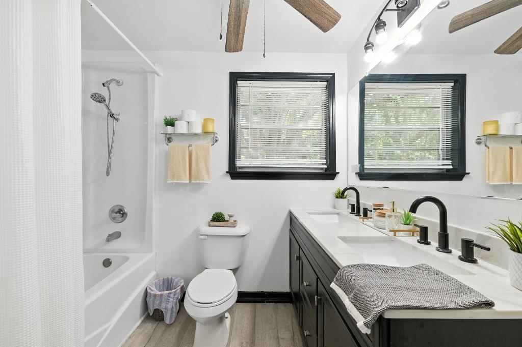 1637 Starratt Road Jacksonville, FL 32218 - Photo 6 of 44 a bathroom with a sink toilet and shower