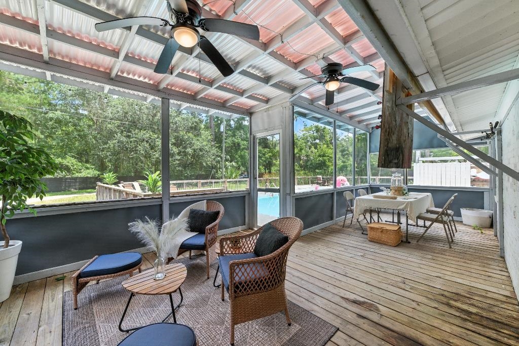 1637 Starratt Road Jacksonville, FL 32218 - Photo 8 of 44 a dining room with furniture and wooden floor