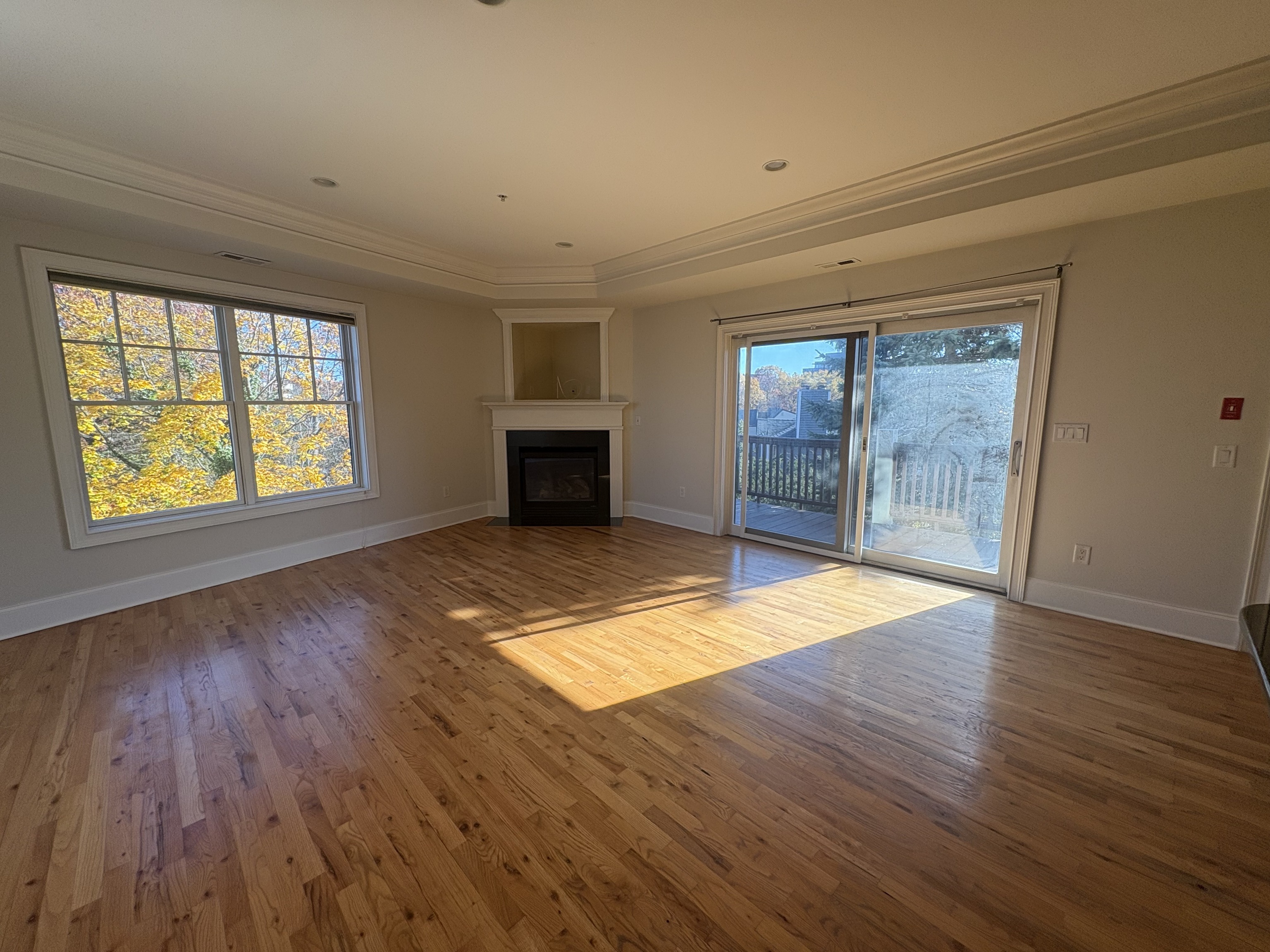21 Seir Hill Road, Unit 6 Norwalk, CT 06850 - Photo 6 of 22 an empty room with wooden floor and windows