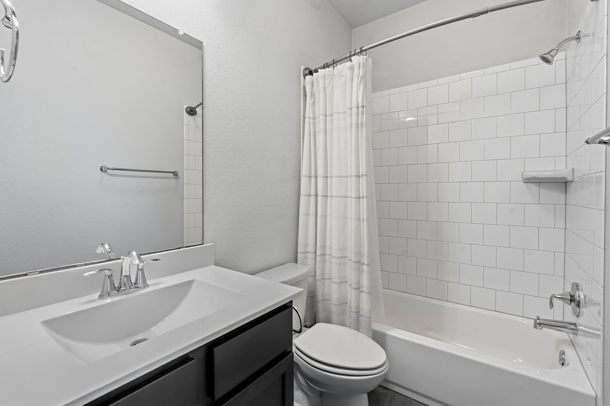 4409 Festival Path, Unit 26 Austin, TX 78741 - Photo 16 of 21 a bathroom with a sink toilet and shower