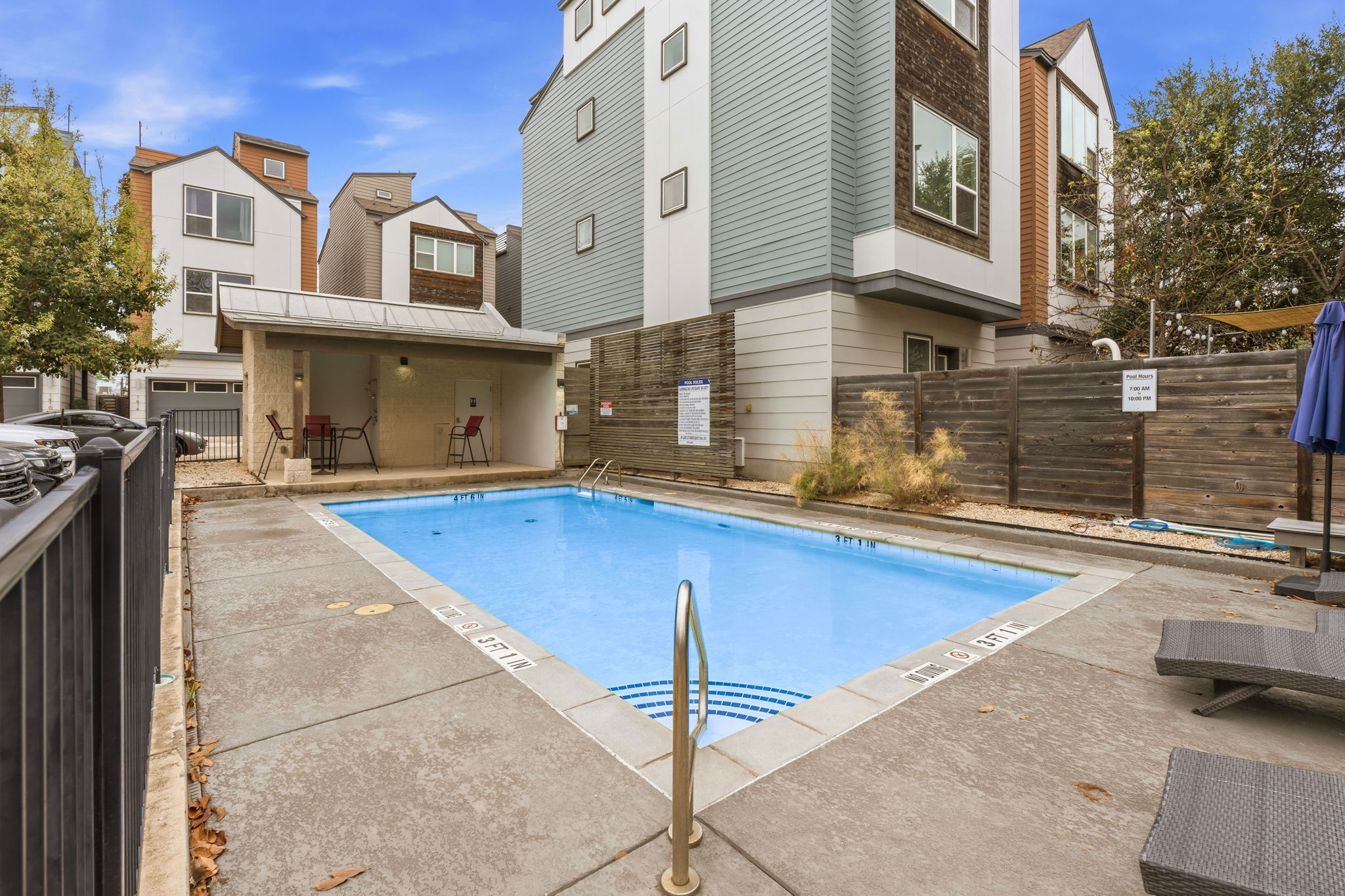 4409 Festival Path, Unit 26 Austin, TX 78741 - Photo 22 of 24 Community pool featuring a patio area