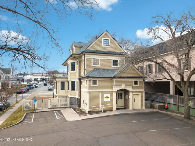 a view of a street with buildings