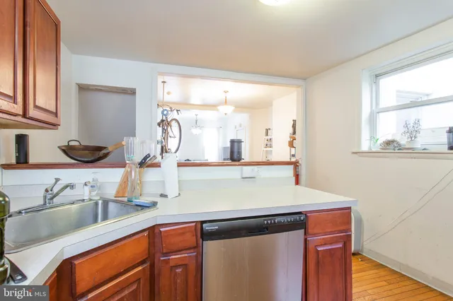 a room with a sink and a mirror