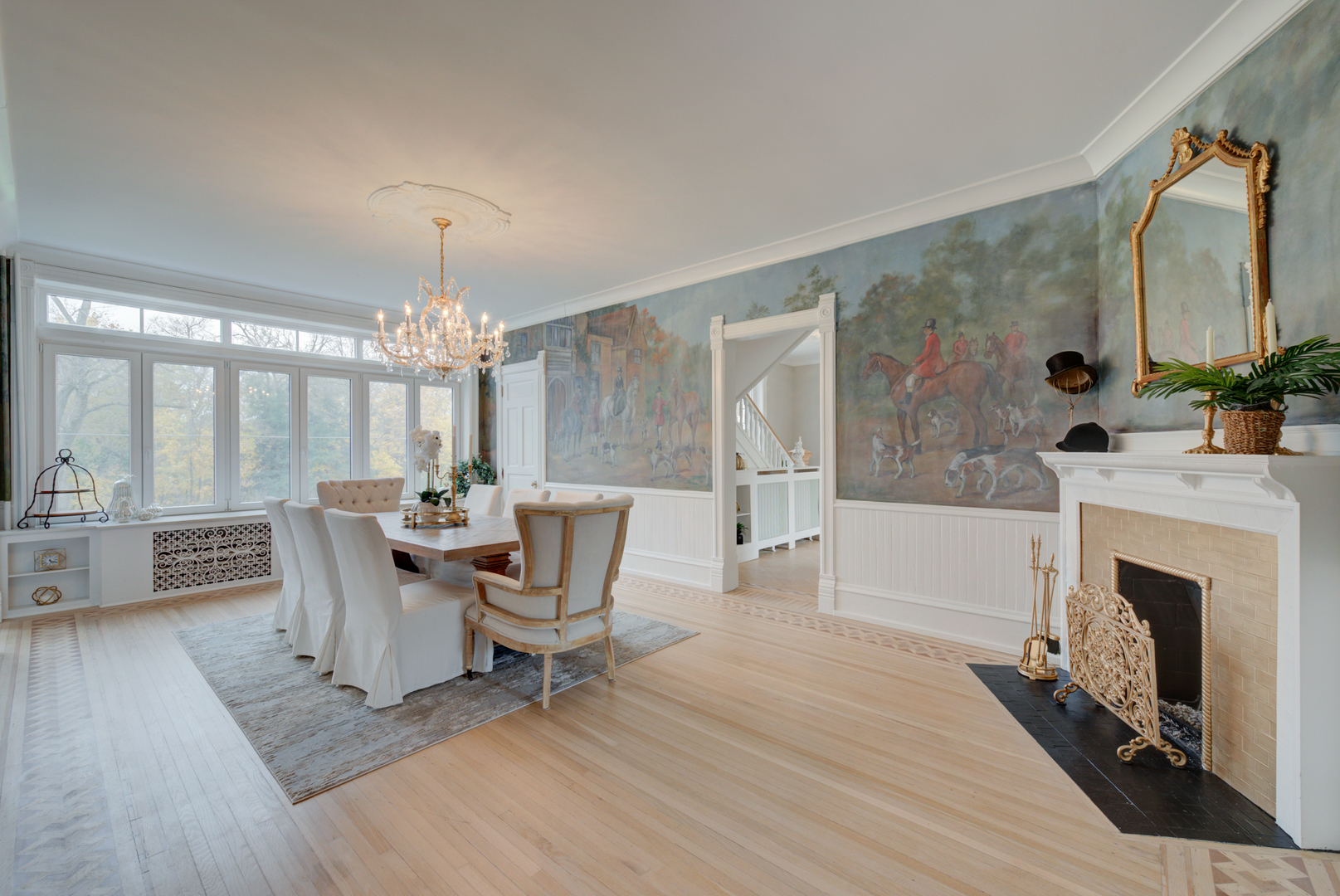 31W141 Army Trail Road Wayne, IL 60184 - Photo 12 of 63 a living room with furniture a fireplace and a chandelier
