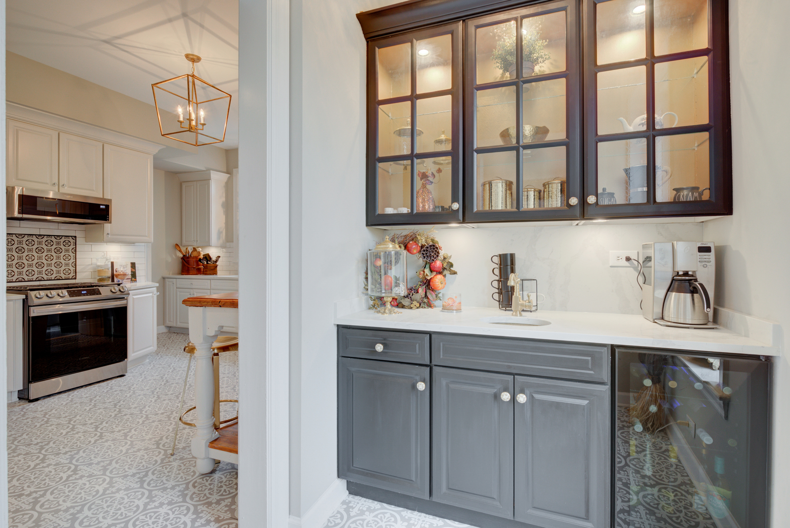 31W141 Army Trail Road Wayne, IL 60184 - Photo 18 of 63 a kitchen with stainless steel appliances granite countertop a refrigerator and a sink