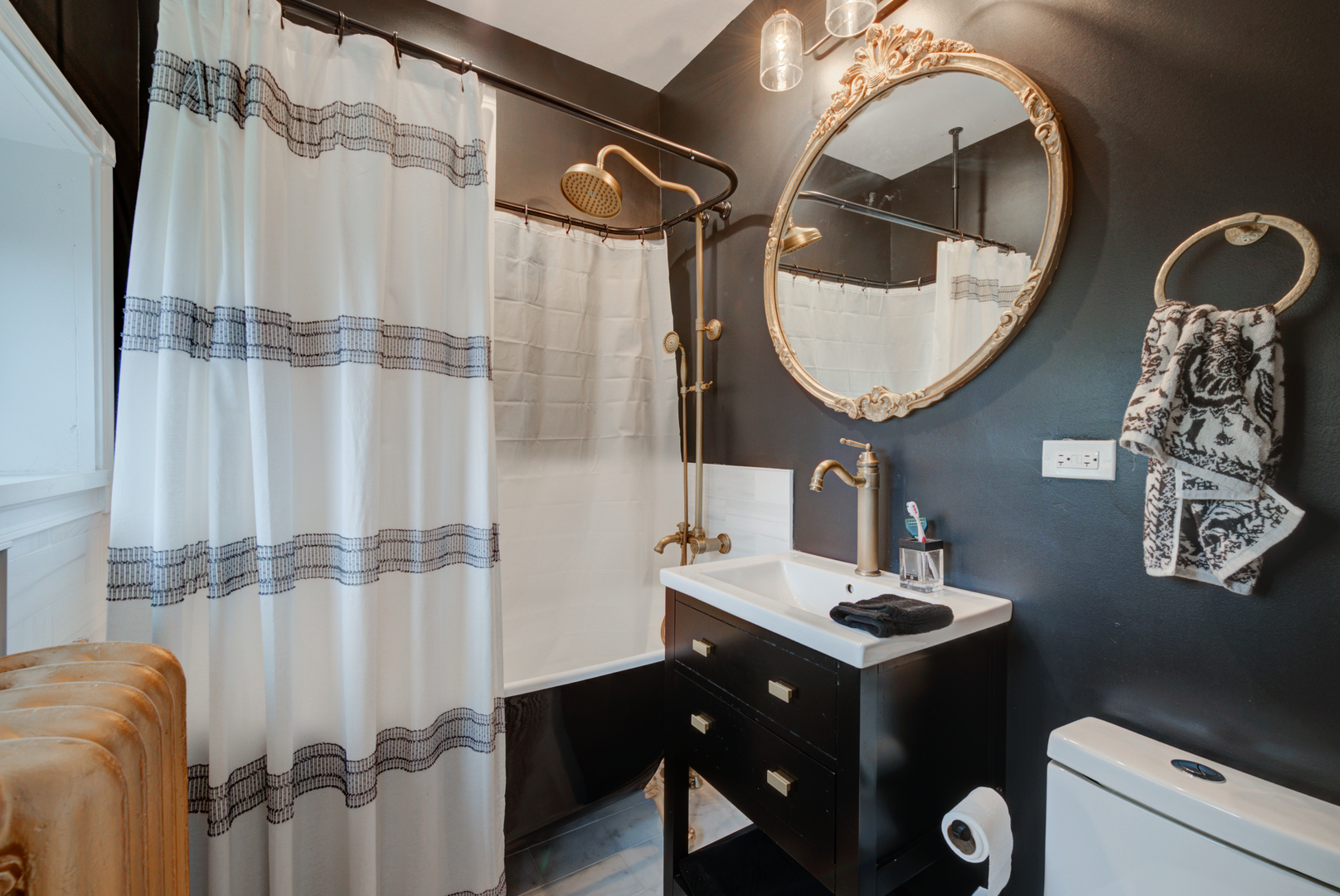 31W141 Army Trail Road Wayne, IL 60184 - Photo 28 of 63 a bathroom with a sink and mirror