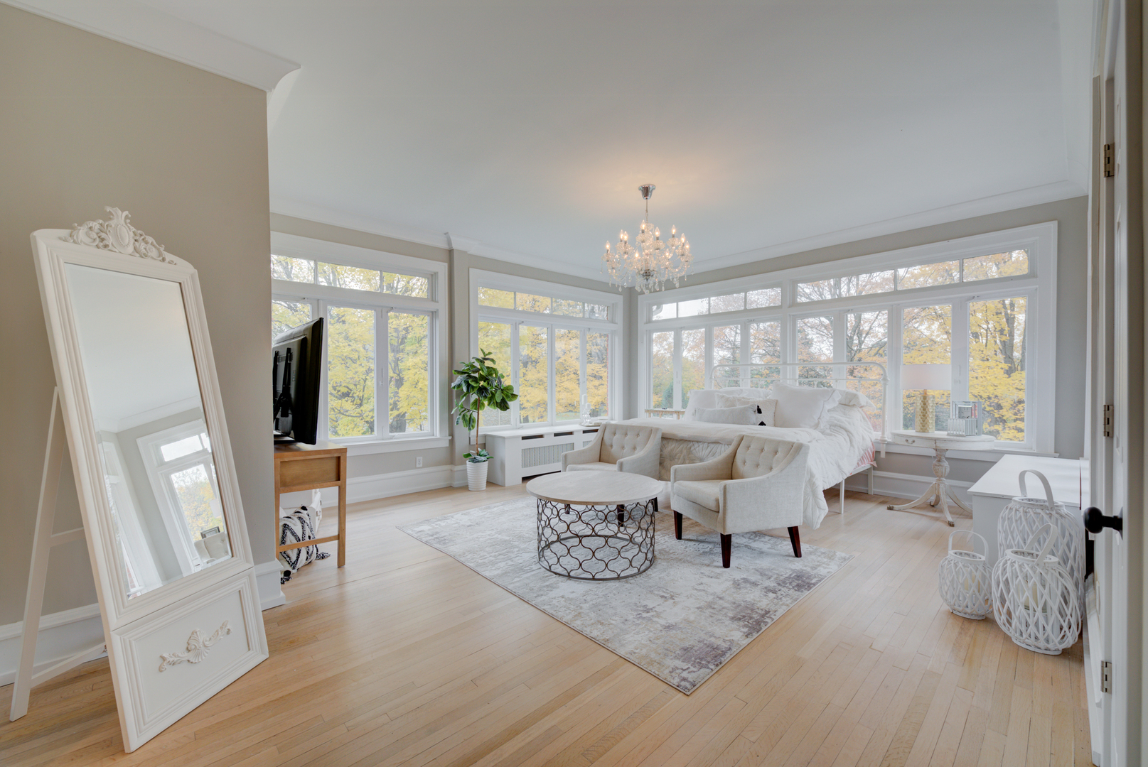 31W141 Army Trail Road Wayne, IL 60184 - Photo 29 of 63 a living room with furniture large window and wooden floor