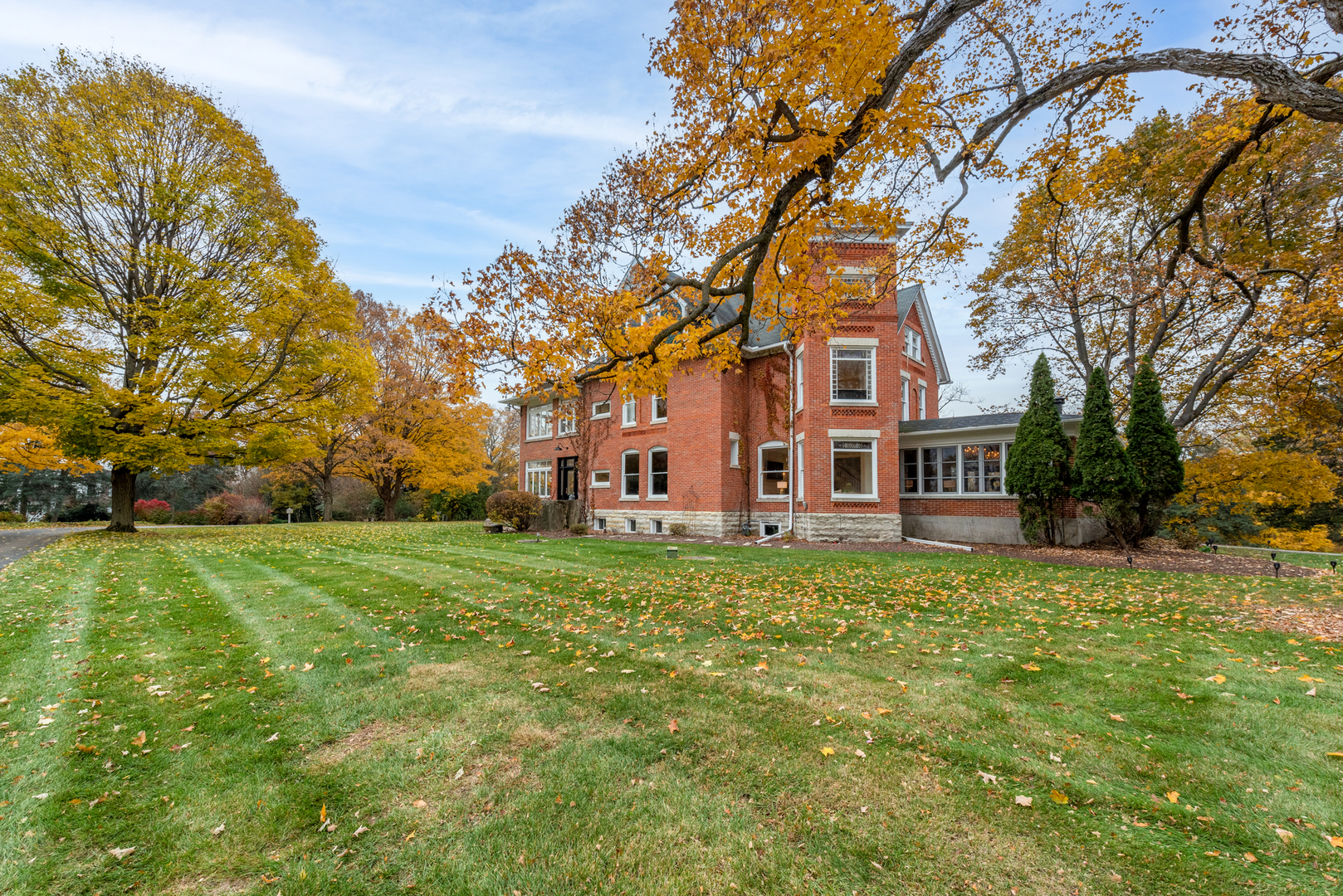 31W141 Army Trail Road Wayne, IL 60184 - Photo 4 of 63 a view of a house with a big yard