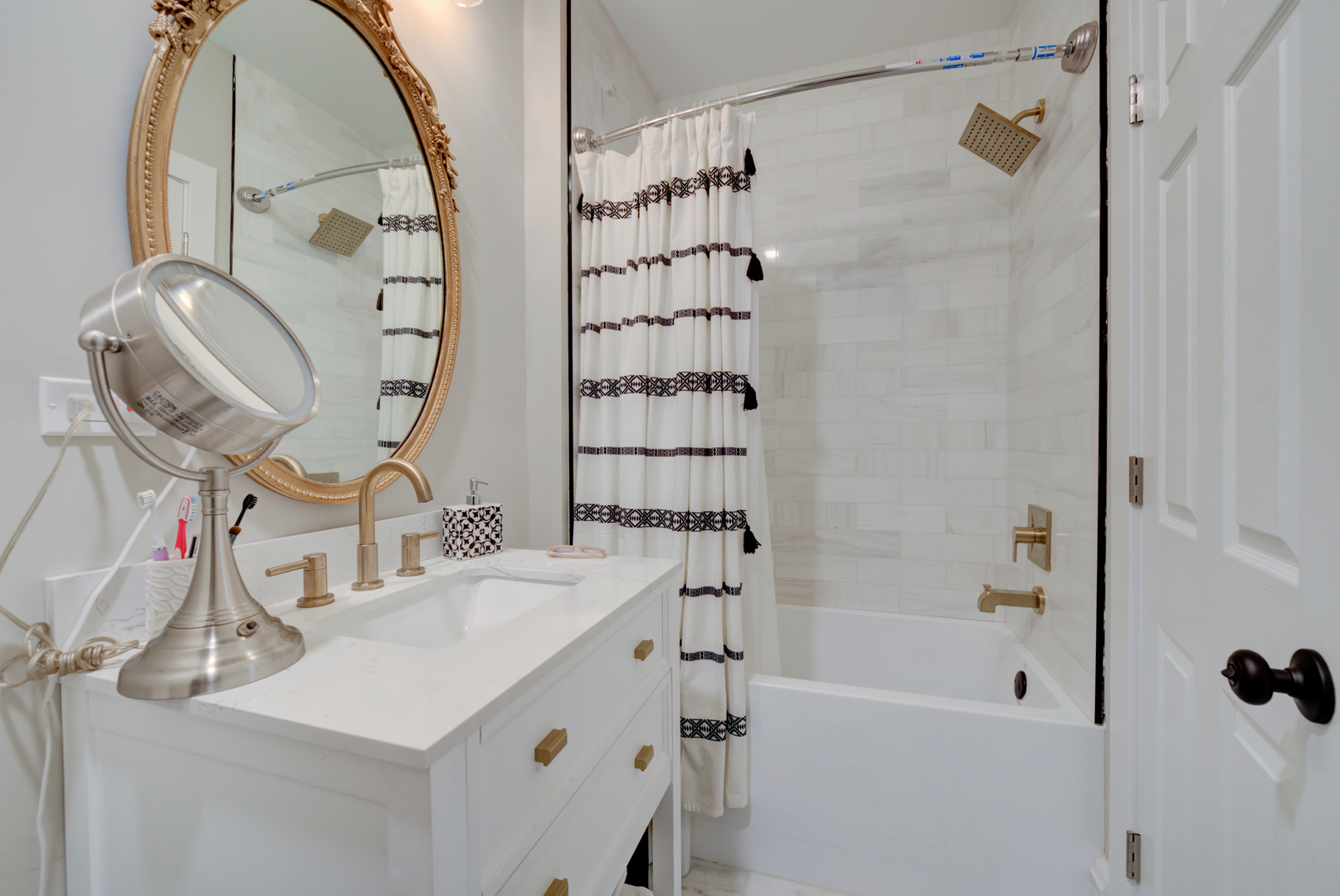 31W141 Army Trail Road Wayne, IL 60184 - Photo 31 of 63 a bathroom with a sink and a mirror