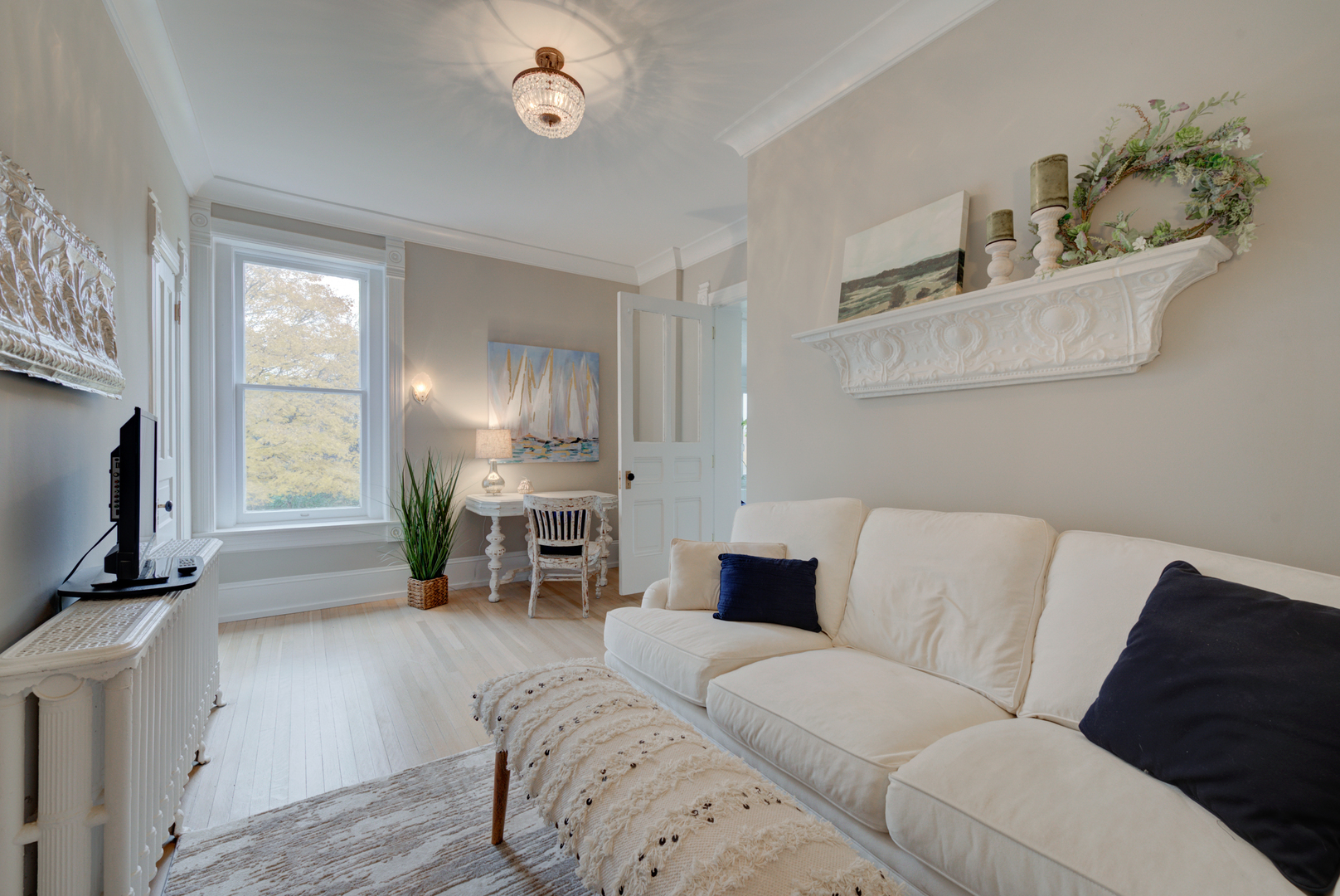 31W141 Army Trail Road Wayne, IL 60184 - Photo 32 of 63 a living room with furniture and a flat screen tv