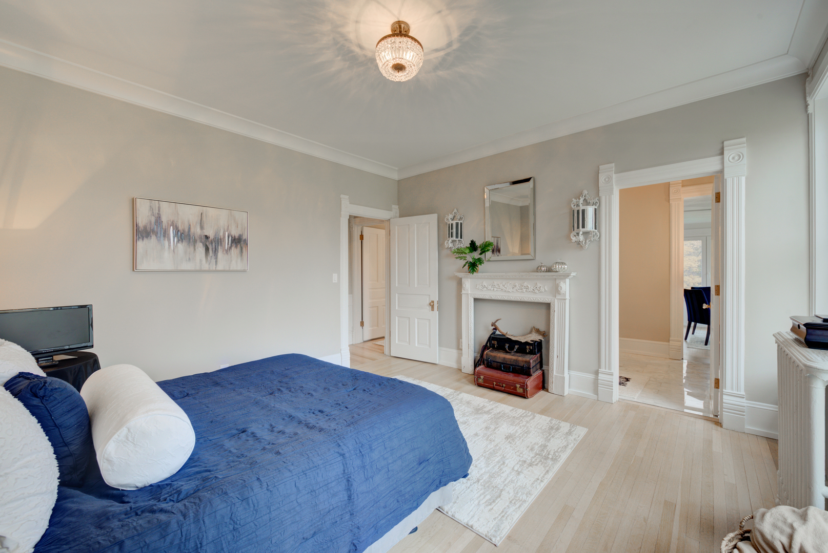 31W141 Army Trail Road Wayne, IL 60184 - Photo 35 of 63 a bedroom with a bed and a fireplace