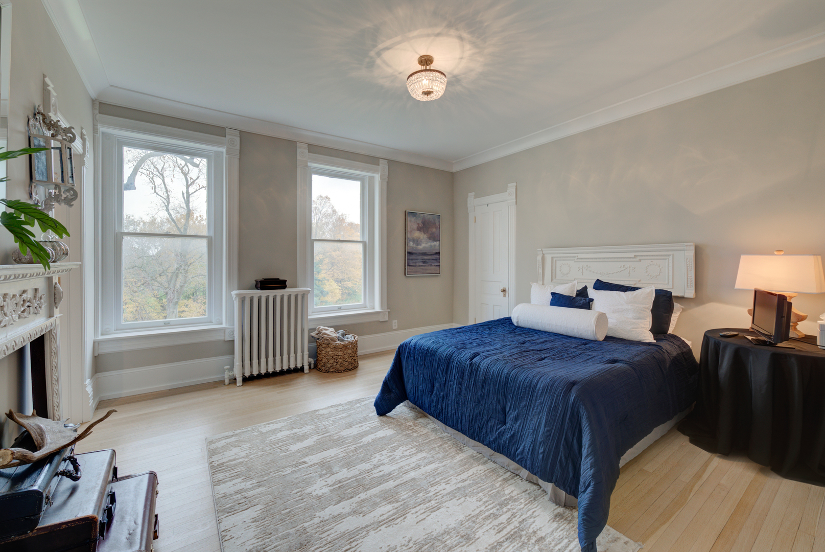 31W141 Army Trail Road Wayne, IL 60184 - Photo 36 of 63 a spacious bedroom with a bed and a tv on table