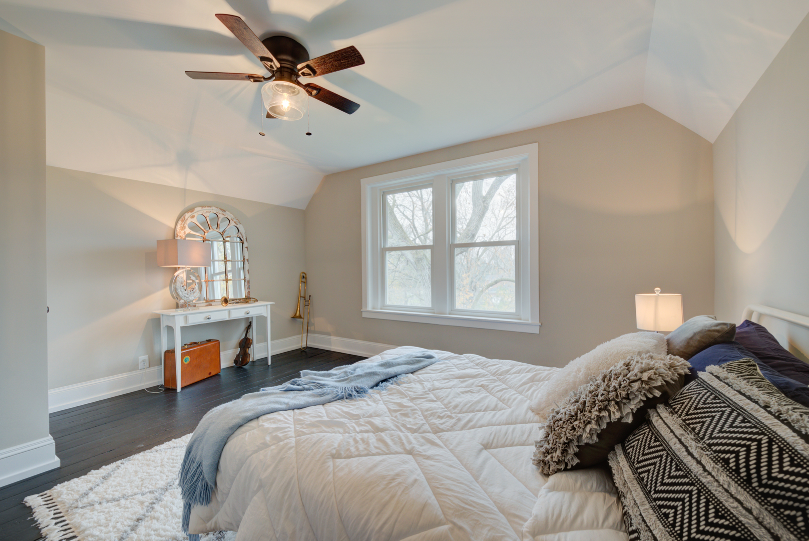 31W141 Army Trail Road Wayne, IL 60184 - Photo 42 of 63 a bedroom with a bed and a chandelier