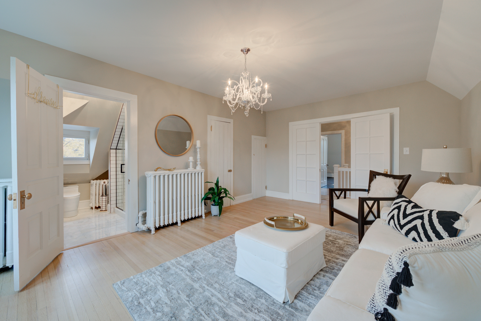 31W141 Army Trail Road Wayne, IL 60184 - Photo 44 of 63 a living room with furniture and a chandelier