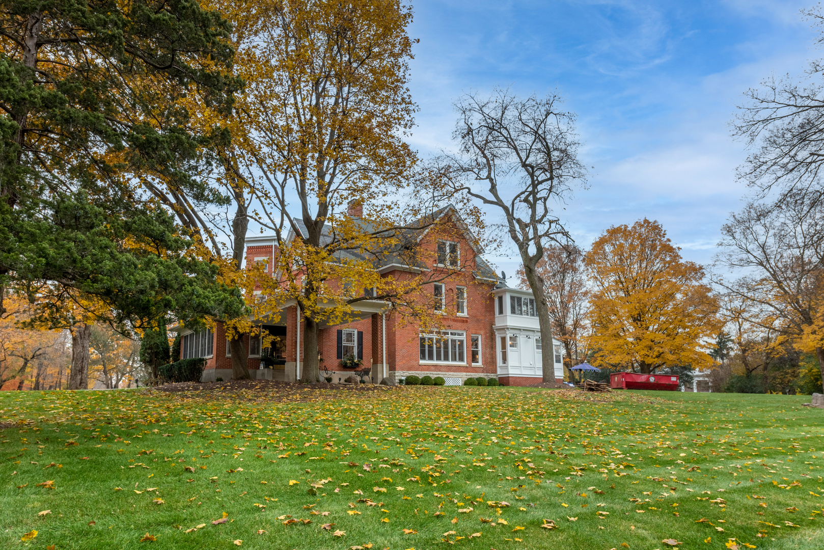 31W141 Army Trail Road Wayne, IL 60184 - Photo 58 of 63 a front view of a house with garden