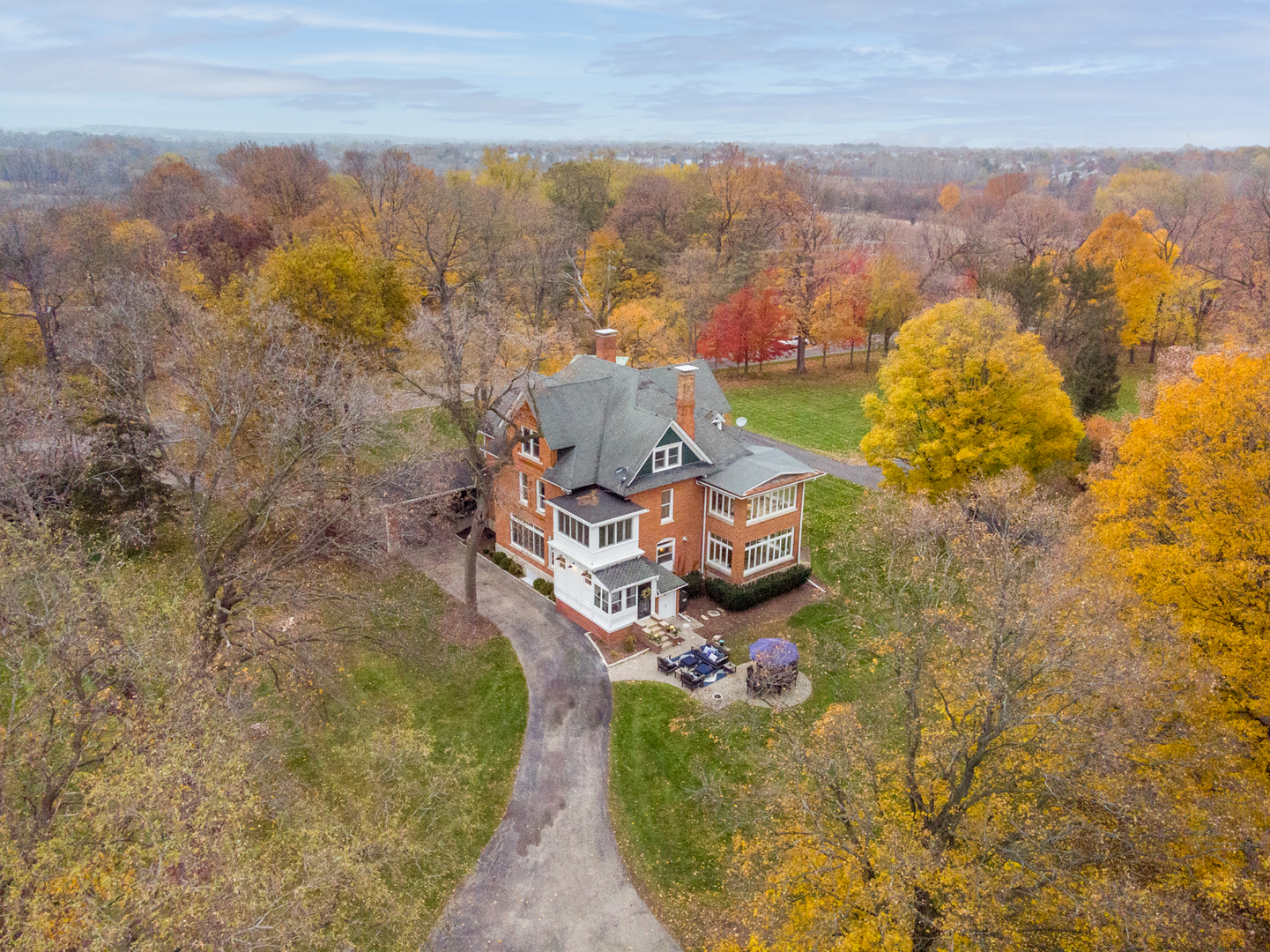 31W141 Army Trail Road Wayne, IL 60184 - Photo 61 of 63 an aerial view of a house with a yard and lake view