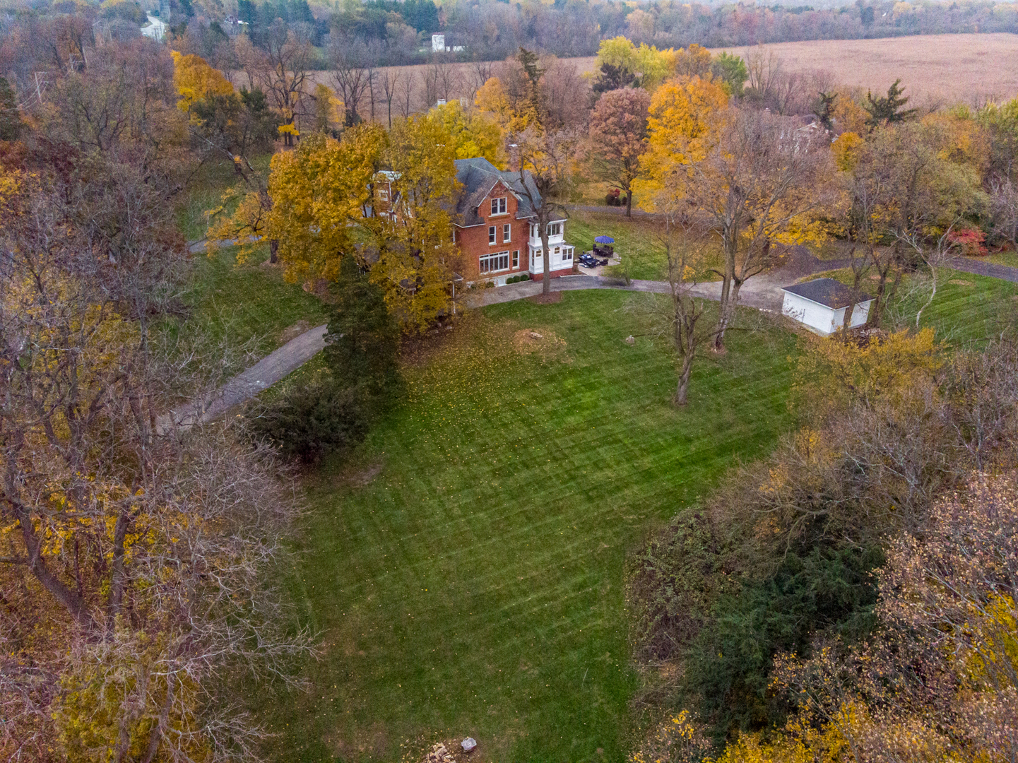 31W141 Army Trail Road Wayne, IL 60184 - Photo 62 of 63 a view of a houses with a yard