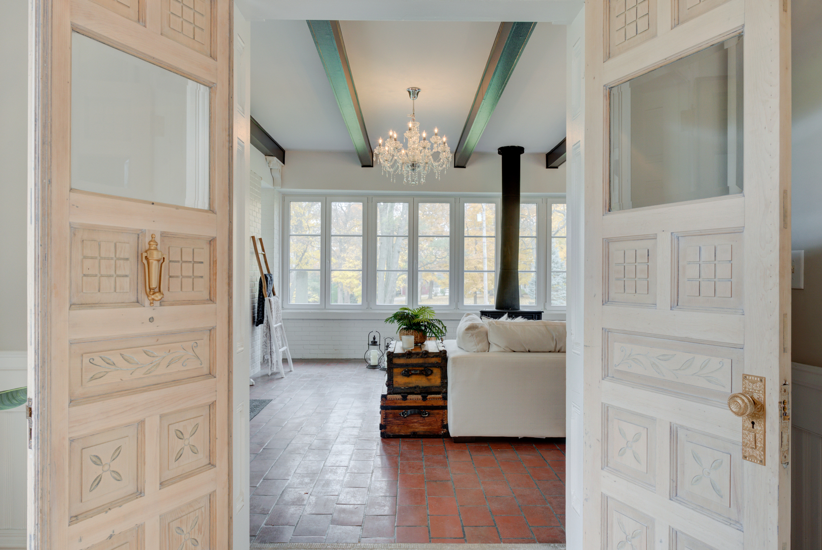 31W141 Army Trail Road Wayne, IL 60184 - Photo 8 of 63 a living room with furniture and a chandelier