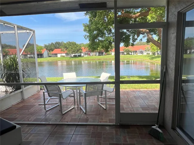 a view of swimming pool from a balcony