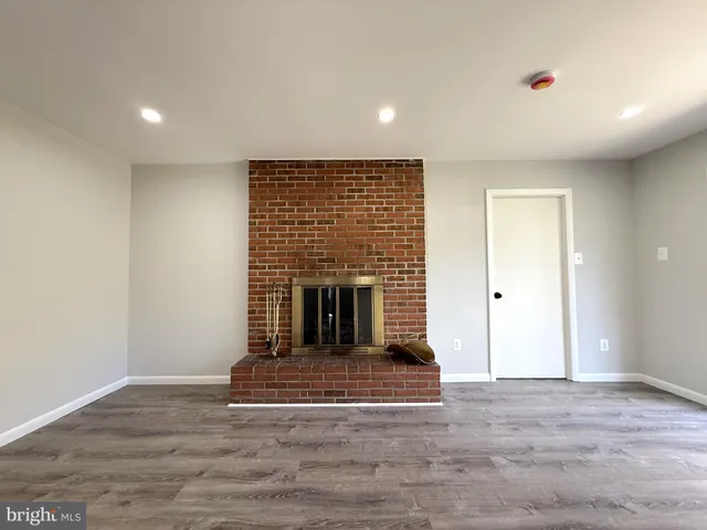 a view of a livingroom with a fireplace