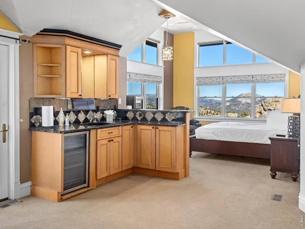 a kitchen with a sink and a refrigerator