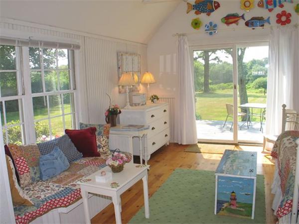 709 Old County Road West Tisbury, MA 02568 - Photo 16 of 22 a living room with furniture and a large window
