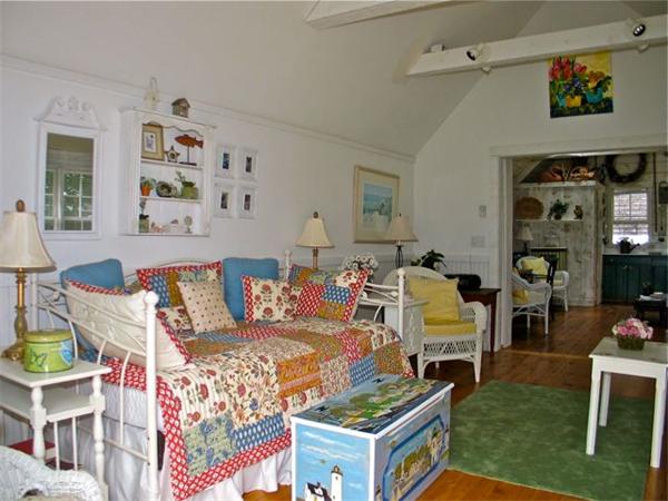 709 Old County Road West Tisbury, MA 02568 - Photo 19 of 22 a living room with furniture and a rug