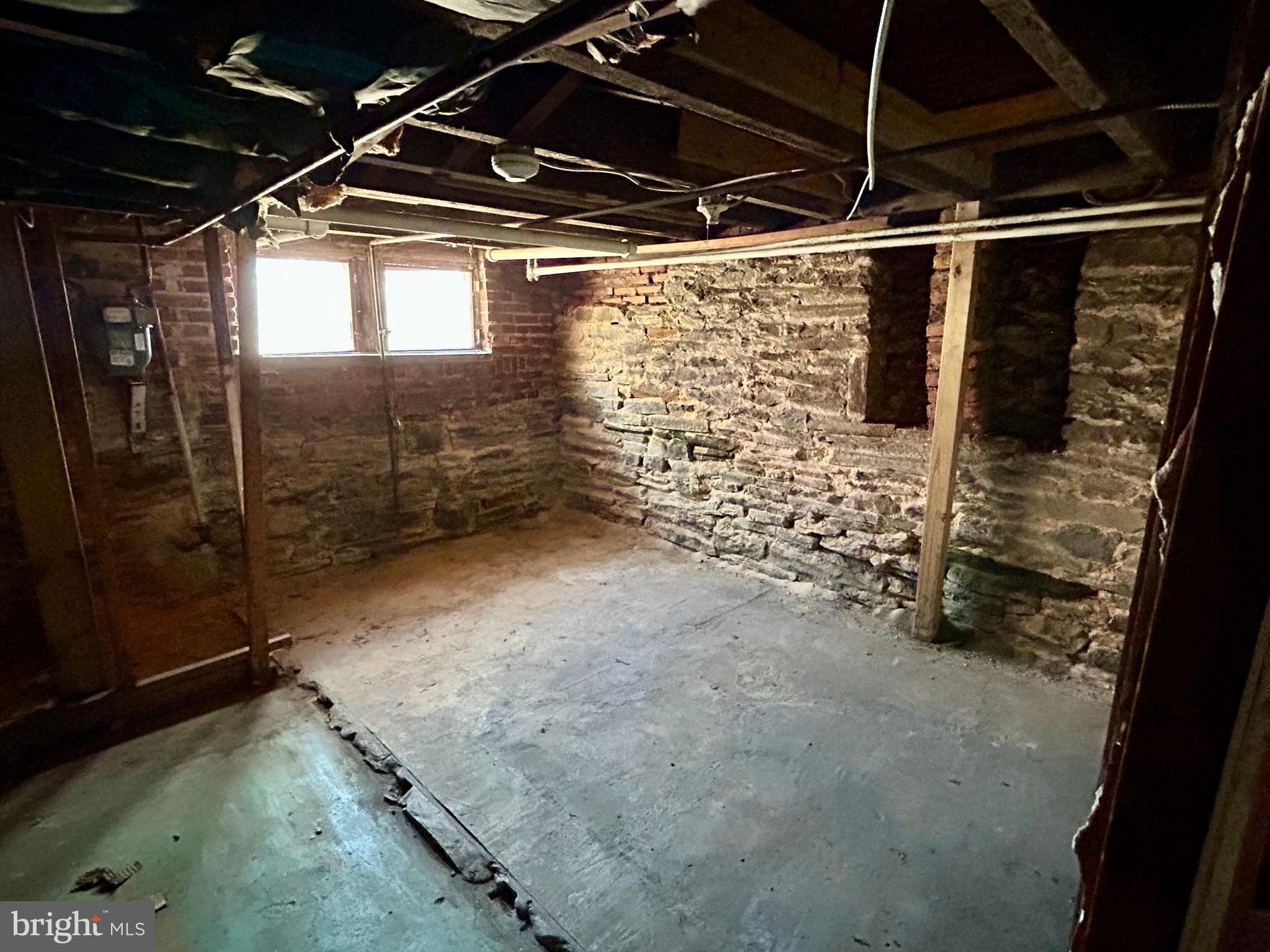 2504 North Calvert Street, Unit 1 Baltimore, MD 21218 - Photo 12 of 13 a view of an empty room with wooden floor