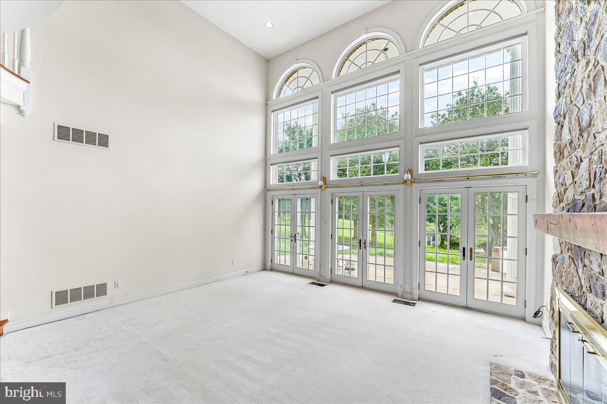 1015 Lambourne Road West Chester, PA 19382 - Photo 11 of 69 Family Room Wall of Windows