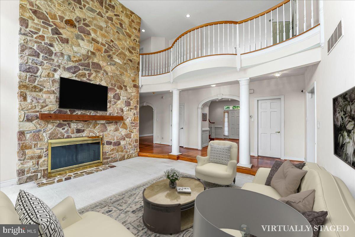 1015 Lambourne Road West Chester, PA 19382 - Photo 12 of 69 Family room and upstairs hallway