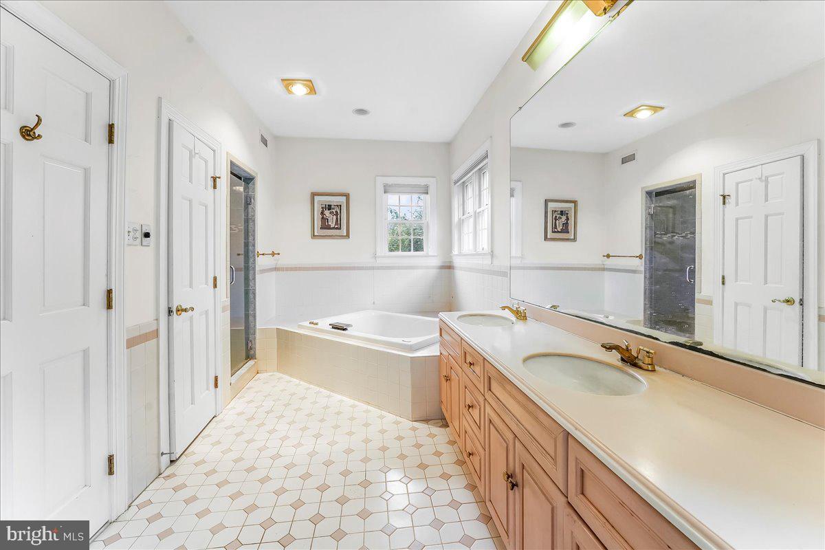 1015 Lambourne Road West Chester, PA 19382 - Photo 32 of 69 Primary Bath with soaking tub and shower stall
