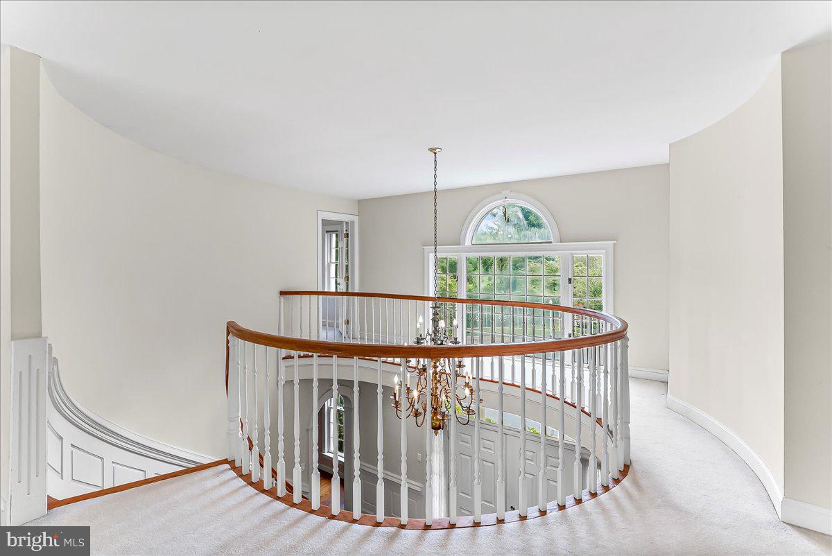 1015 Lambourne Road West Chester, PA 19382 - Photo 35 of 69 Second Floor Hallway showing circular stairs