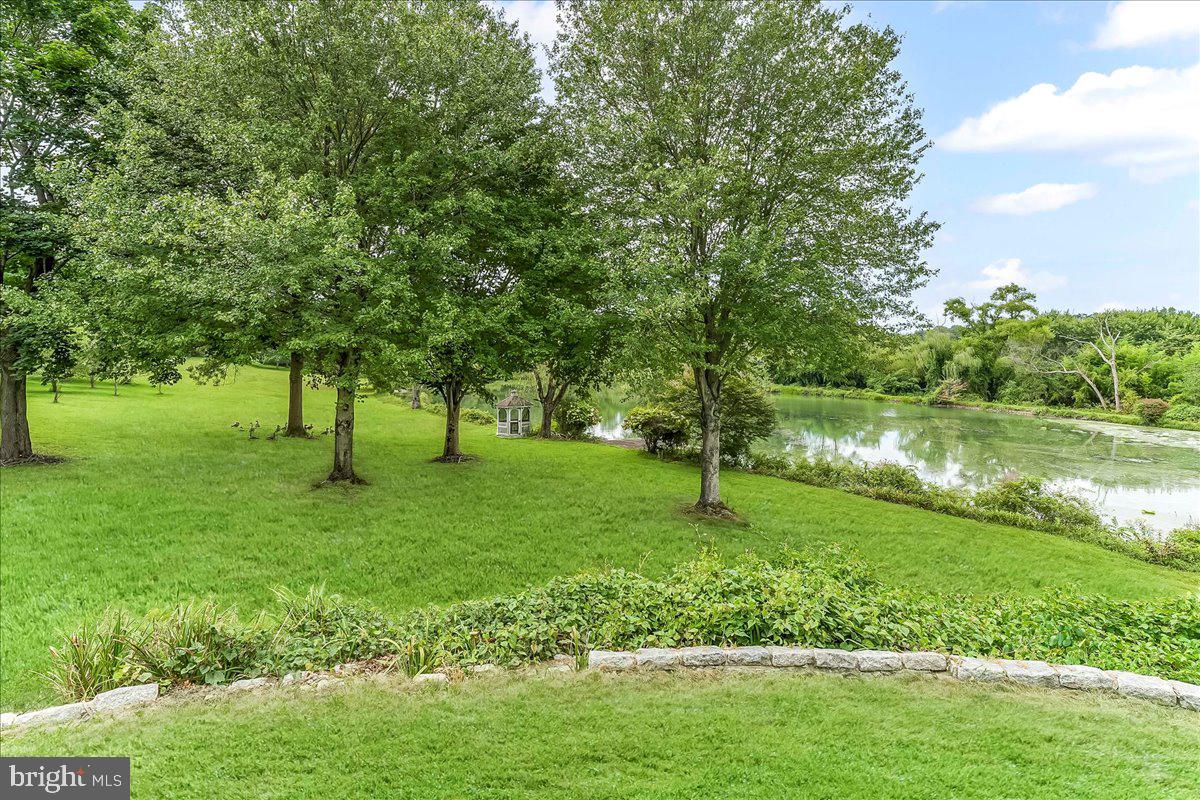 1015 Lambourne Road West Chester, PA 19382 - Photo 56 of 69 Back yard and view of pond