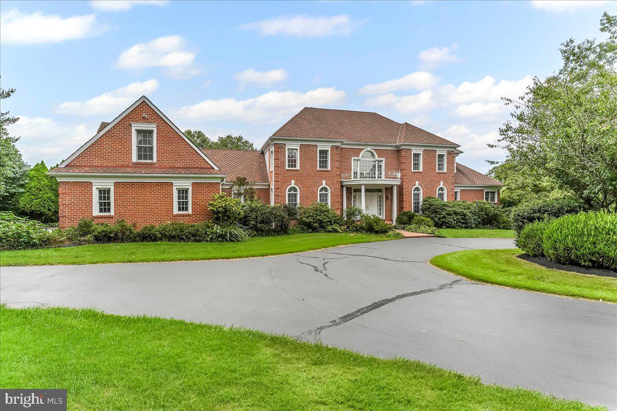 1015 Lambourne Road West Chester, PA 19382 - Photo 61 of 69 Front of home and circular driveway