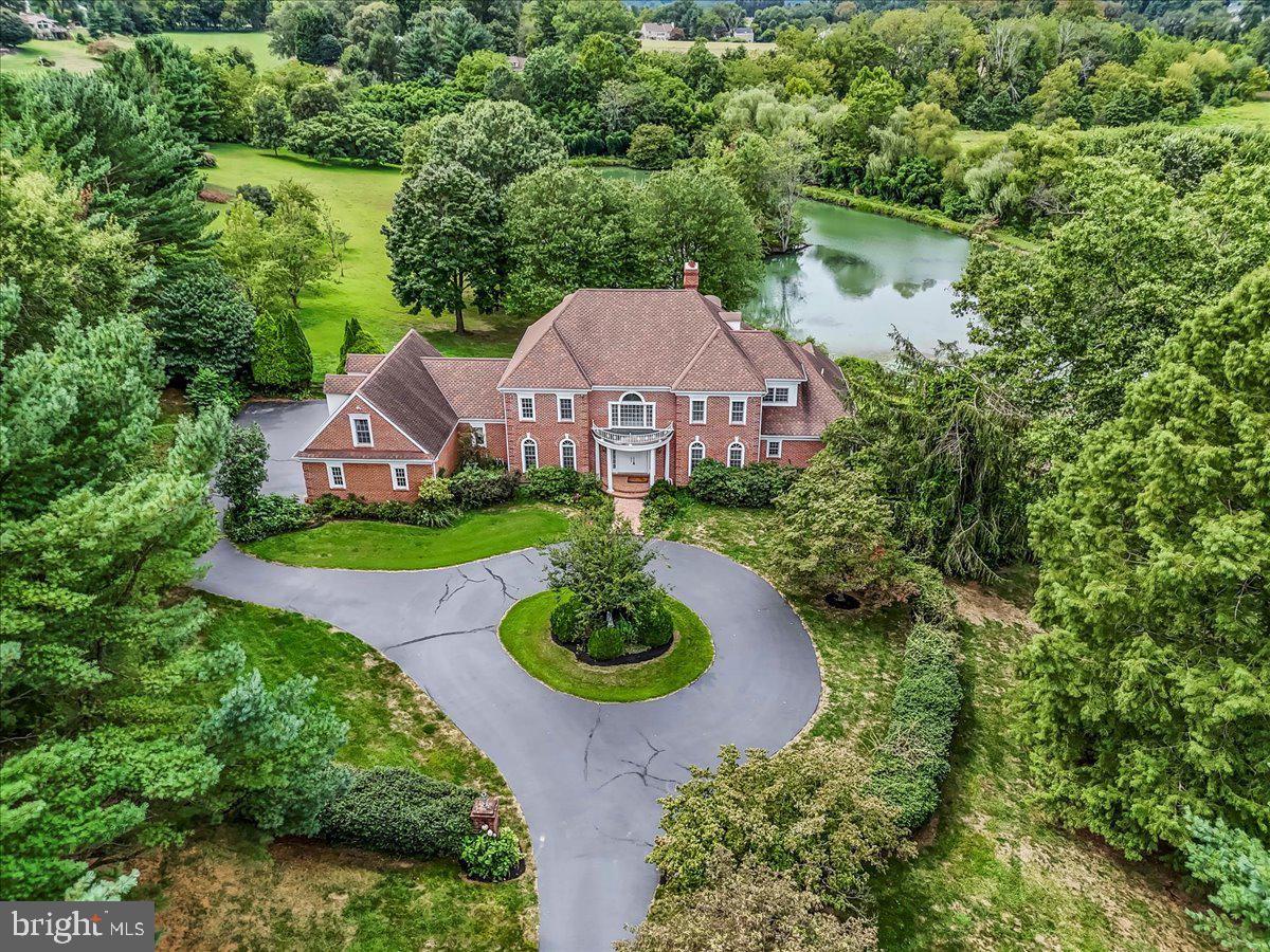 1015 Lambourne Road West Chester, PA 19382 - Photo 66 of 69 Front of the home and pond in