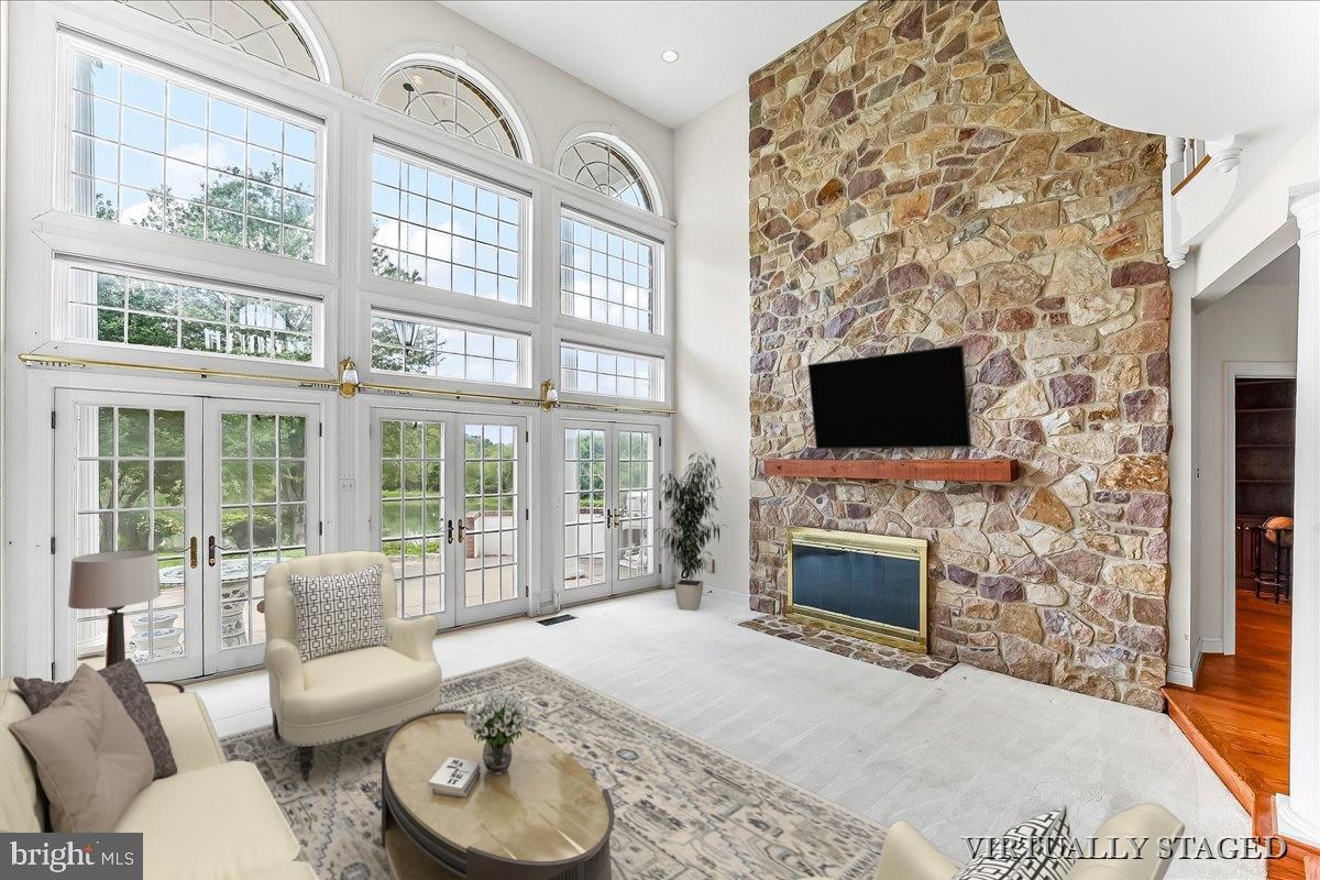 1015 Lambourne Road West Chester, PA 19382 - Photo 8 of 69 Family room and stone fireplace