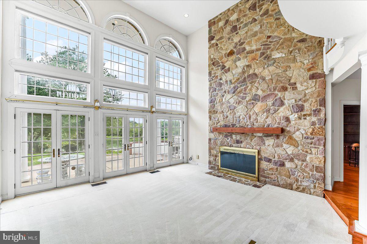 1015 Lambourne Road West Chester, PA 19382 - Photo 9 of 69 Family room and stone fireplace