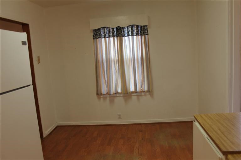 301 Chestnut Street Ropesville, TX 79358 - Photo 4 of 9 a view of an empty room with a window