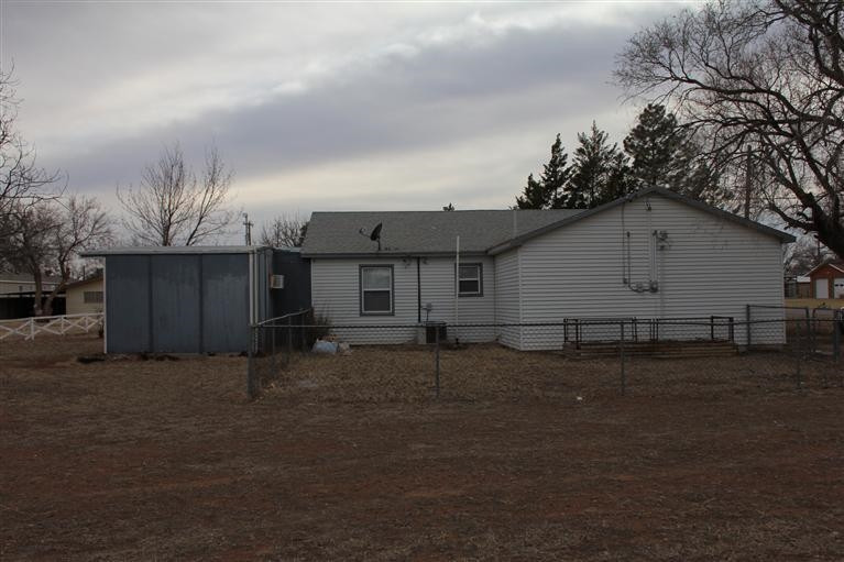 301 Chestnut Street Ropesville, TX 79358 - Photo 9 of 9 a view of a house with backyard