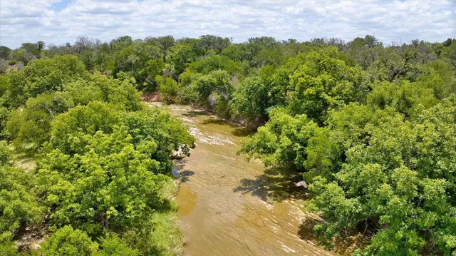 a view of a lake with a building