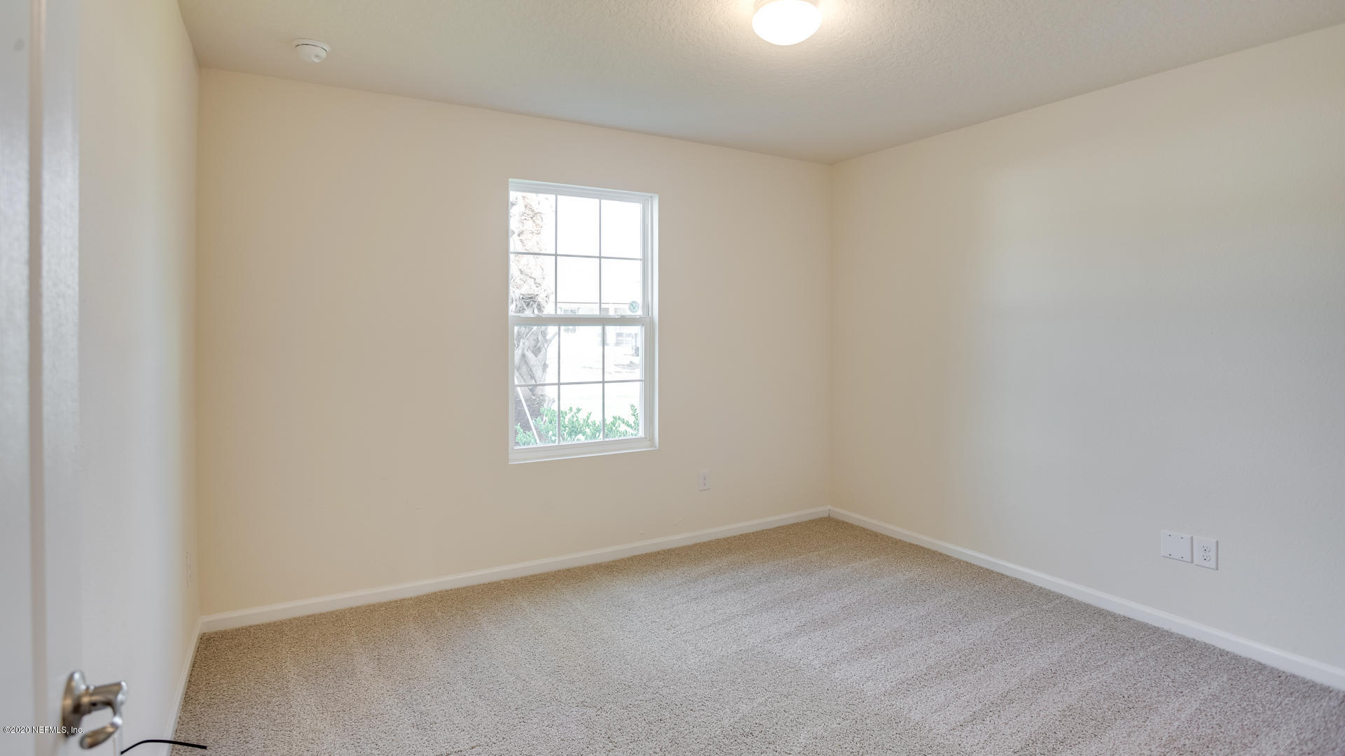 410 Palace Drive St. Augustine, FL 32084 - Photo 12 of 29 an empty room with a window