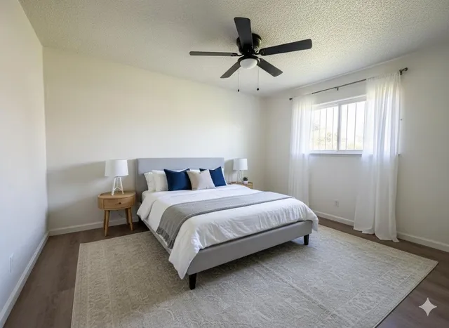 a bedroom with a bed and window