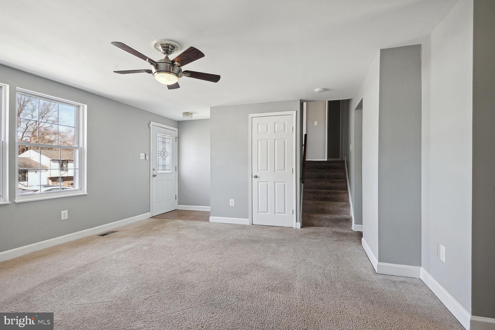 120 North Garfield Road Sterling, VA 20164 - Photo 4 of 19 Living Room View to Upper level & lower with door