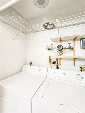 a room with a bed and a window