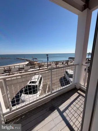 a close view of a stove a microwave and cabinets