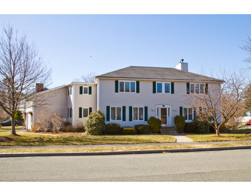 9 Meadow Road Beverly, MA 01915 - Photo 1 of 1 a front view of a house with a garden